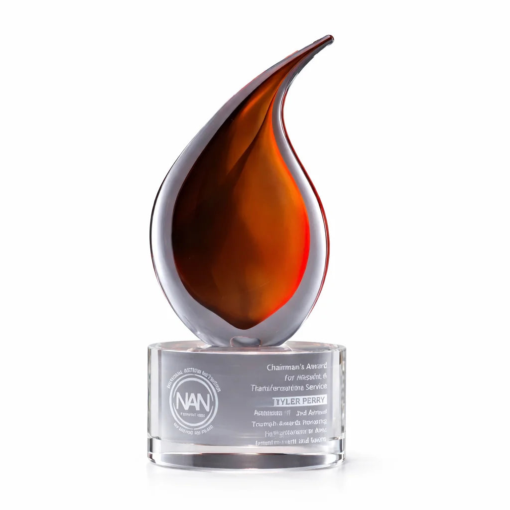 Decorative glass award with a teardrop shape on a white background