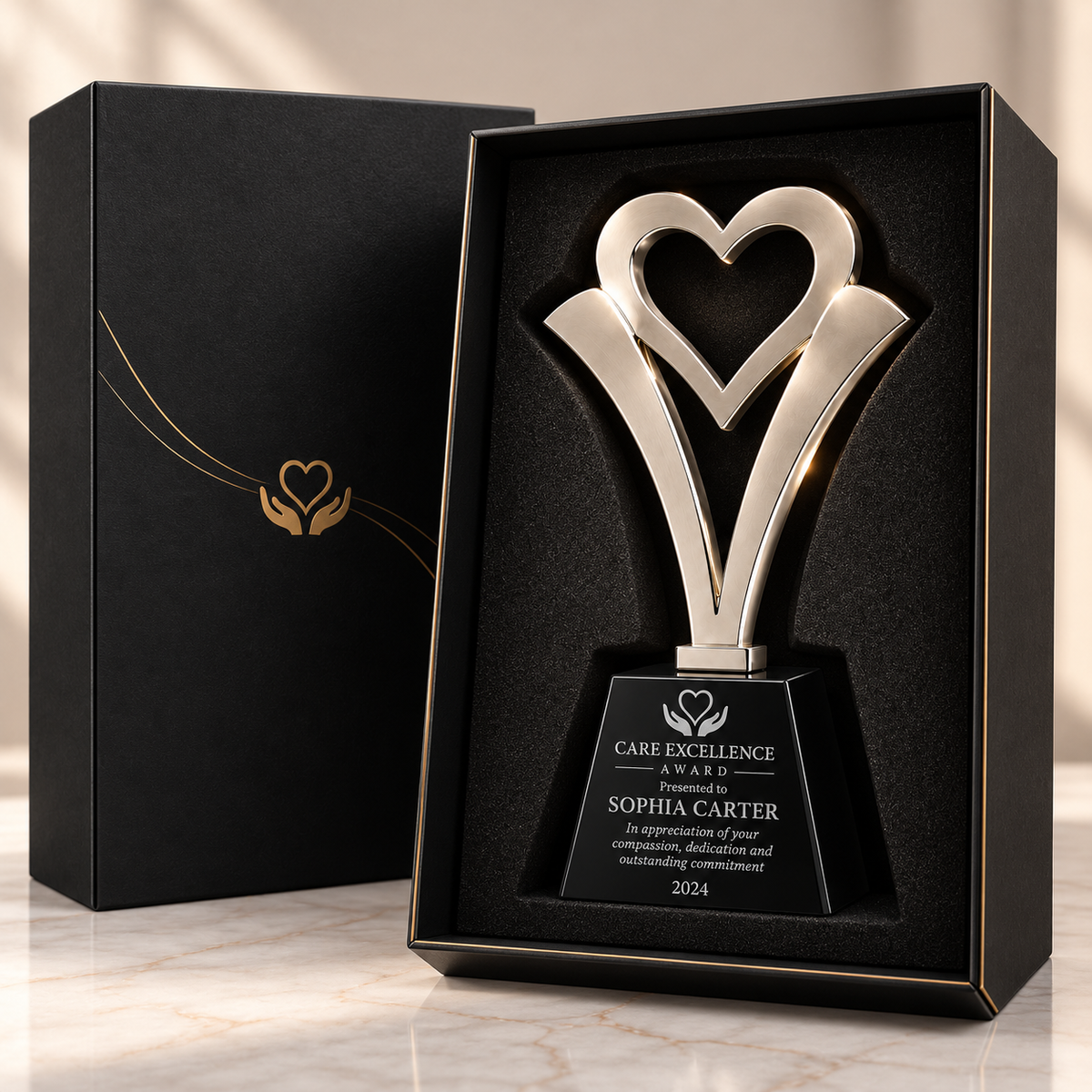 Personalized sculptural metal heart award with engraved plate for corporate gratitude